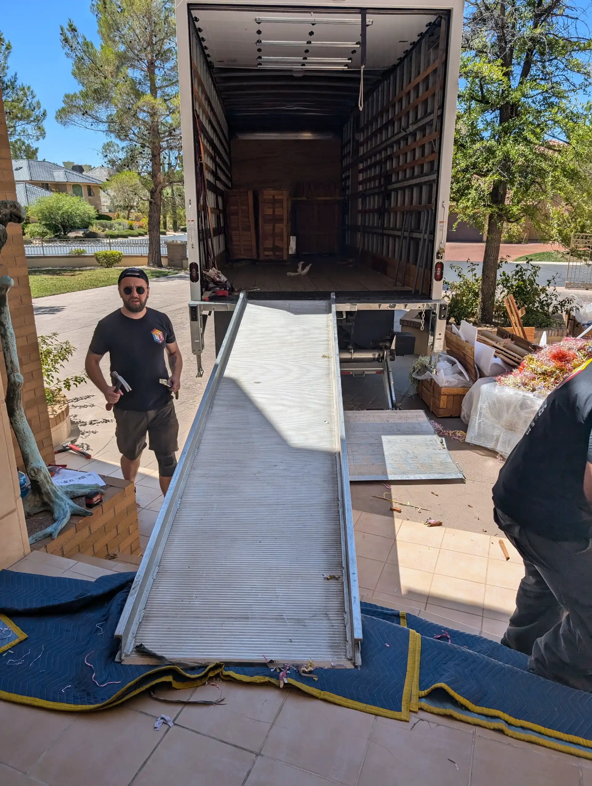 Moving truck with its ramp down at a Las Vegas home for a small local move