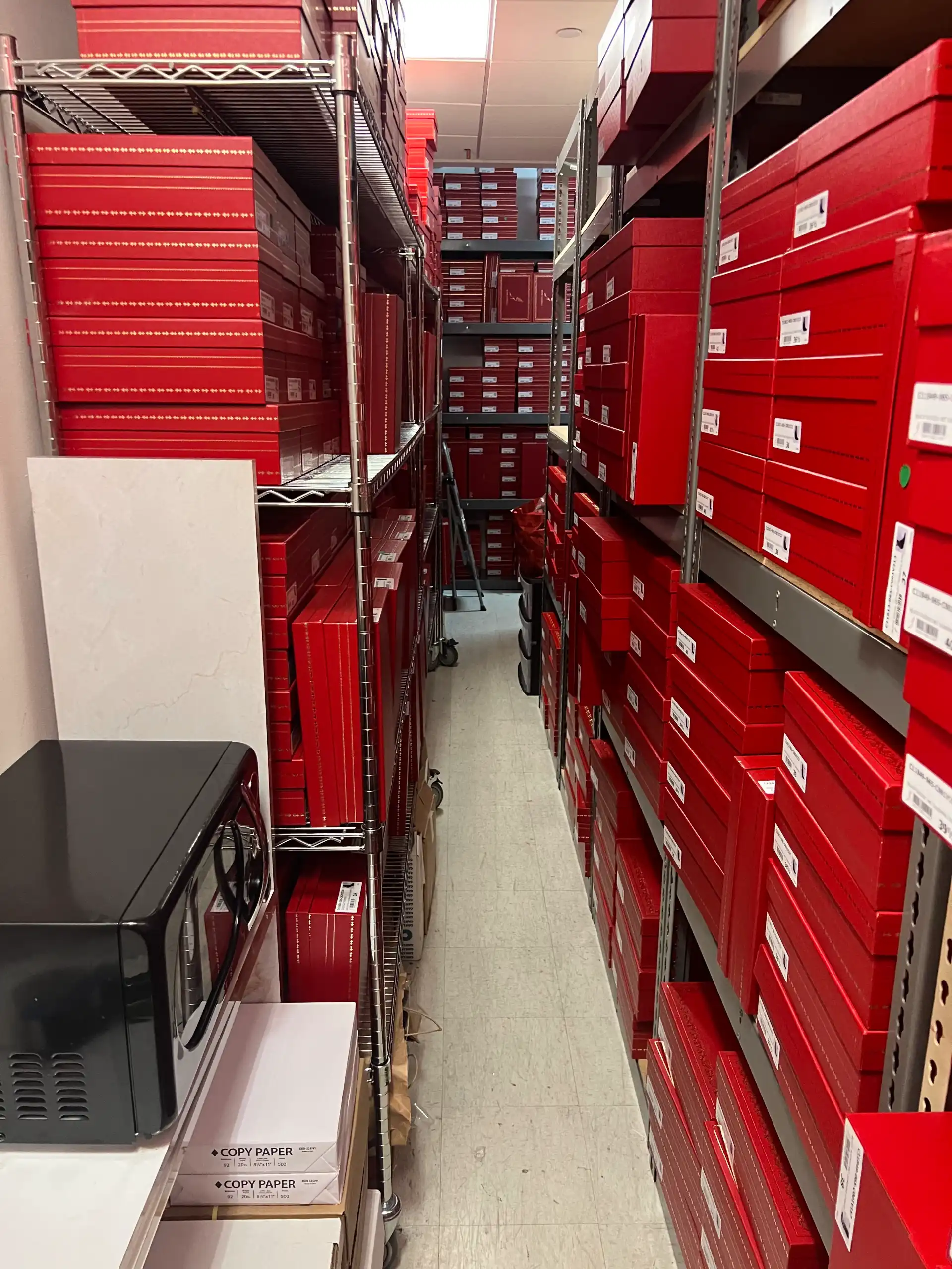 Labeled inventory boxes shelved aisle by aisle in the Las Vegas Warehouse fulfillment area