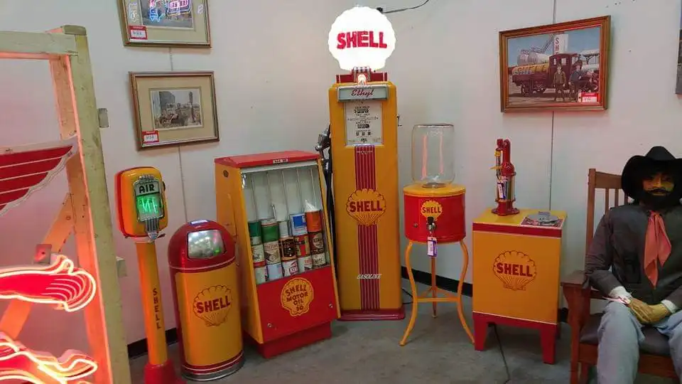 Vintage Shell service-station memorabilia arranged and stored inside the warehouse